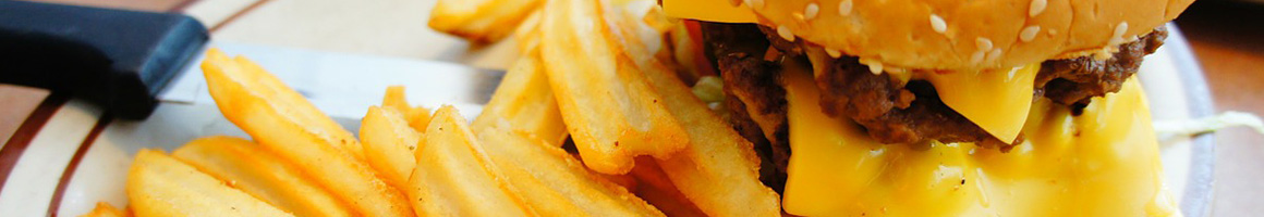 Eating Burger at Burgatory restaurant in Homestead, PA.